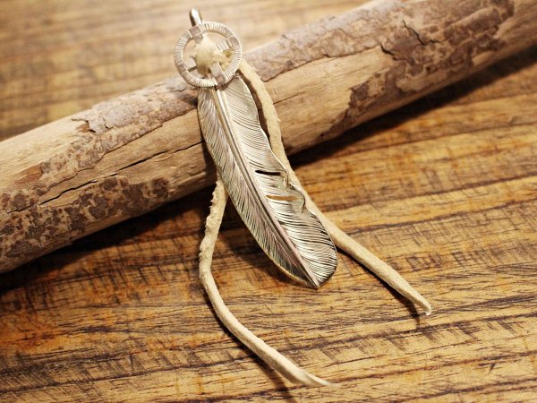 FEATHER (L) with MEDICINE WHEEL / SUNSHINE STUDIO