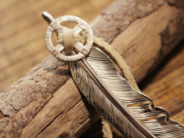 FEATHER (L) with MEDICINE WHEEL / SUNSHINE STUDIO