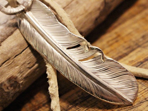 FEATHER (L) with MEDICINE WHEEL / SUNSHINE STUDIO