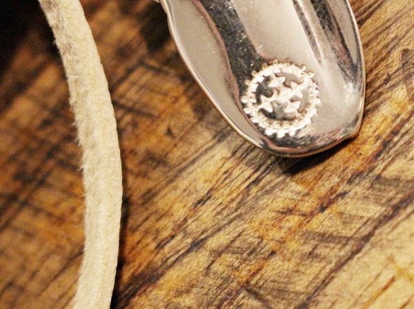 FEATHER (L) with MEDICINE WHEEL / SUNSHINE STUDIO