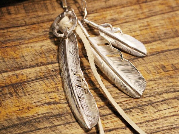 FEATHER (L) with MEDICINE WHEEL / SUNSHINE STUDIO