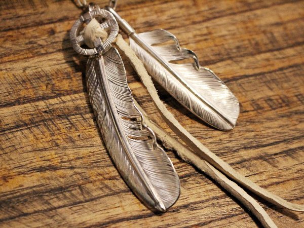 FEATHER (L) with MEDICINE WHEEL / SUNSHINE STUDIO