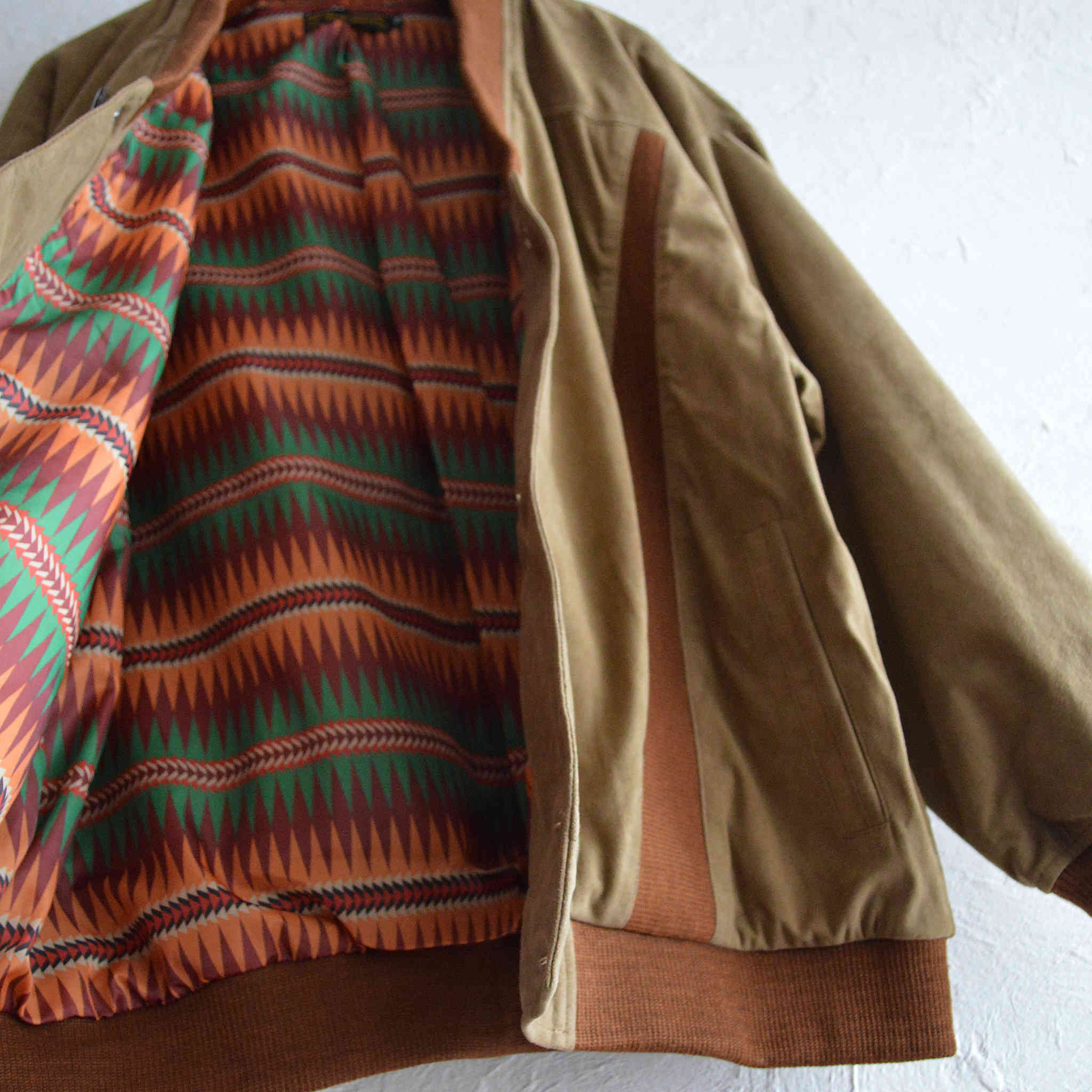 Nasngwam. / ROOT LEATHER CARDIGAN (BROWN)